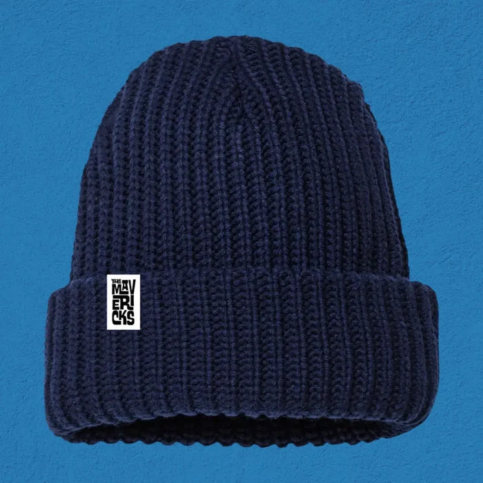 Navy blue knit beanie with a small white rectangular logo patch.